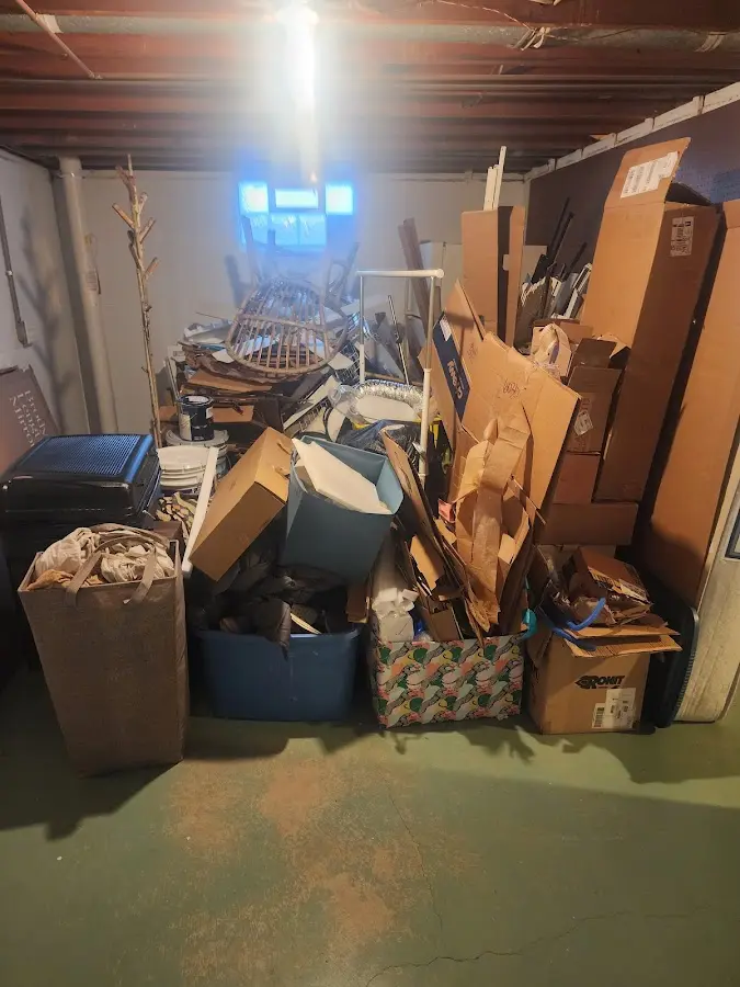 Roll-off dumpster container at job site for Concrete Dumpster Rental in Four Corners